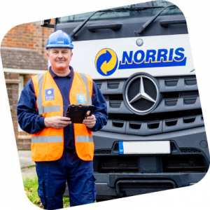A friendly Norris driver at a customer delivery.